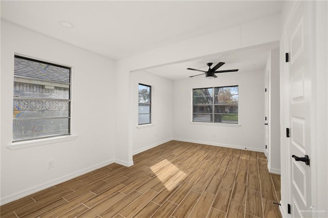 unfurnished room featuring ceiling fan