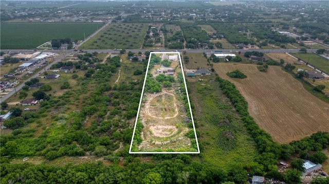 bird's eye view featuring a water view and a rural view