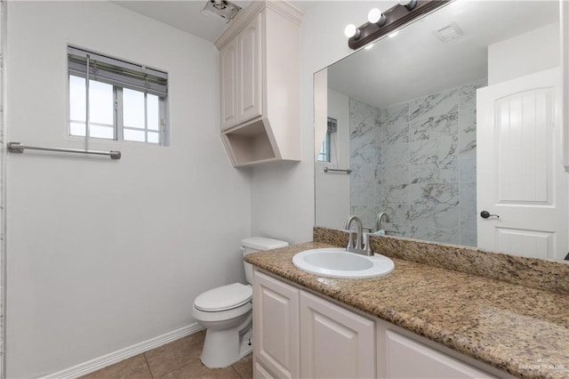 4113 Ulex Ave, Mcallen, TX 78504 - bathroom with vanity, toilet, tile patterned floors, baseboards, and a shower