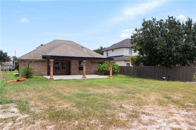 4113 Ulex Ave, Mcallen, TX 78504 - back of property with a patio area, brick siding, and a shingled roof