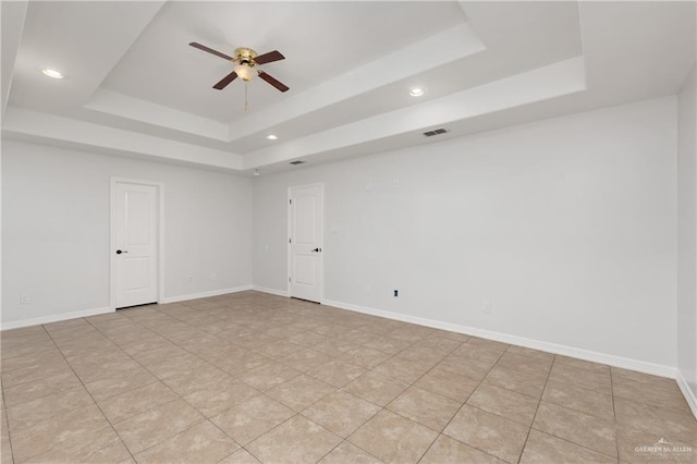 4113 Ulex Ave, Mcallen, TX 78504 - unfurnished room with a tray ceiling, a ceiling fan, recessed lighting, and baseboards