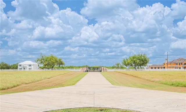 view of home's community featuring a lawn