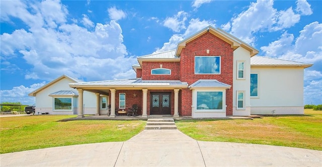 view of front facade featuring a porch and a front lawn