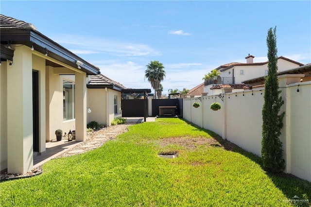 view of yard featuring a fenced backyard