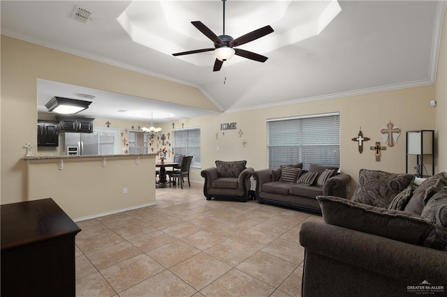 living room featuring visible vents, light tile patterned floors, ornamental molding, ceiling fan with notable chandelier, and lofted ceiling
