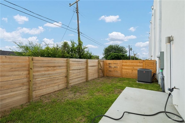 1200 N Lincoln Ave, San Juan, TX 78589 - view of yard featuring central AC and a patio area