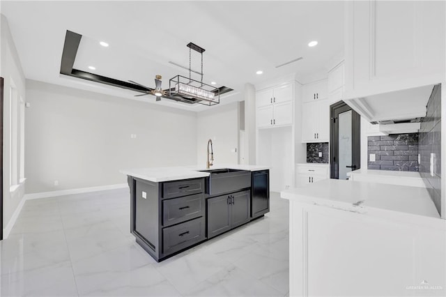 2313 Blue Sky Dr, Weslaco, TX 78599 - kitchen featuring white cabinetry, black dishwasher, light countertops, light marble finish floors, and recessed lighting