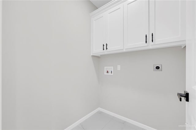 2313 Blue Sky Dr, Weslaco, TX 78599 - washroom featuring cabinet space, electric dryer hookup, and washer hookup