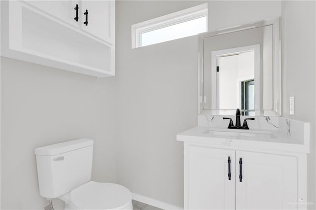 2313 Blue Sky Dr, Weslaco, TX 78599 - half bathroom with toilet and vanity