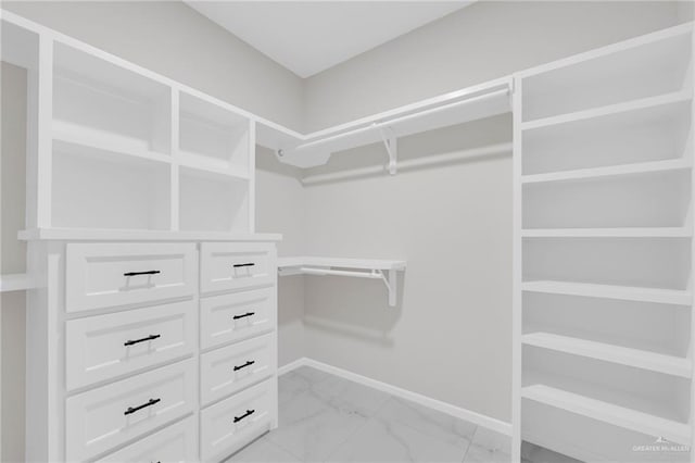 2313 Blue Sky Dr, Weslaco, TX 78599 - walk in closet with light marble finish floors