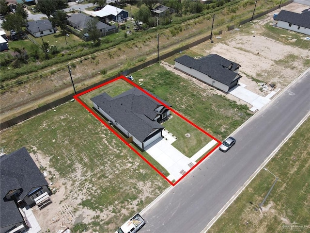 2313 Blue Sky Dr, Weslaco, TX 78599 - aerial view of residential area with property boundaries highlighted