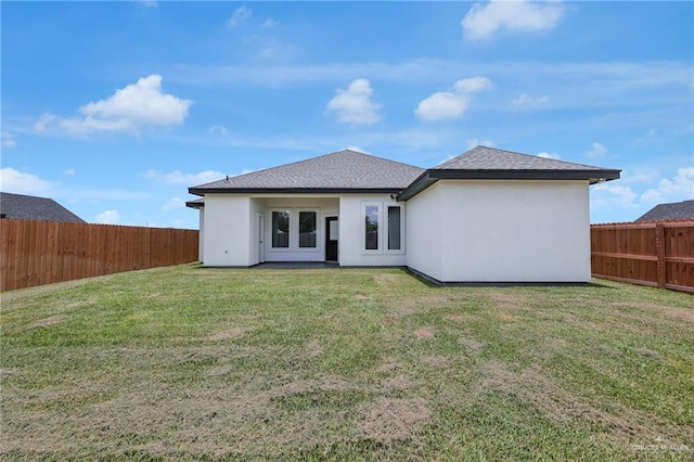 2313 Blue Sky Dr, Weslaco, TX 78599 - rear view of property featuring a fenced backyard and stucco siding