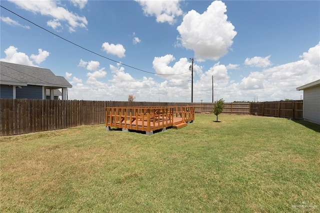 view of yard featuring a deck