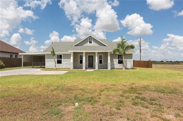 craftsman-style house with a carport and a front yard