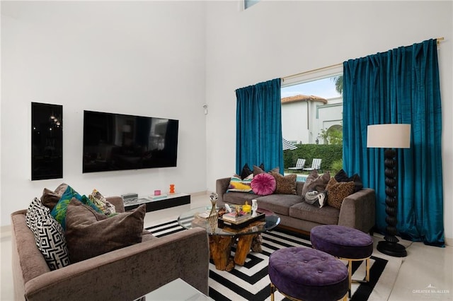 living room featuring light tile patterned flooring