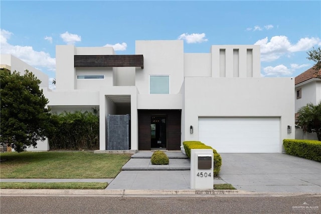 contemporary home featuring a front lawn