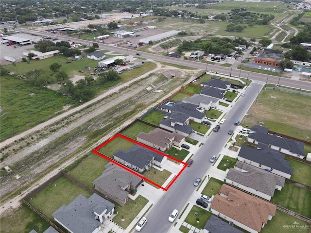 1409 E Danielle Ave E, Pharr, TX 78577 - drone / aerial view with a residential view