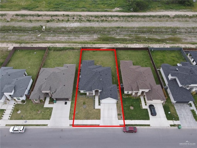 1409 E Danielle Ave E, Pharr, TX 78577 - drone / aerial view with a residential view