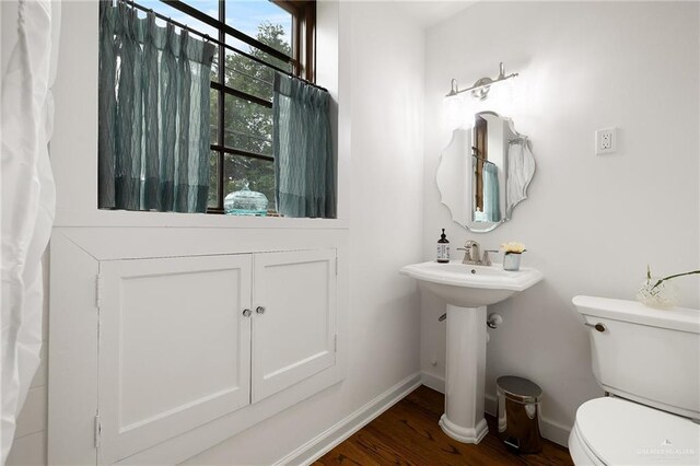 707 N 15th St, Mcallen, TX 78501 - bathroom featuring toilet and wood finished floors
