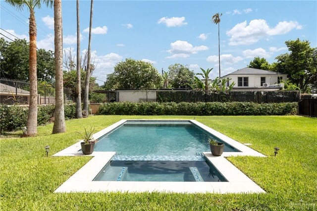 707 N 15th St, Mcallen, TX 78501 - view of pool with a fenced backyard and a pool with connected hot tub