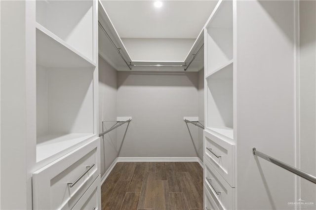 2200 Zinnia St, Weslaco, TX 78599 - walk in closet featuring dark wood finished floors
