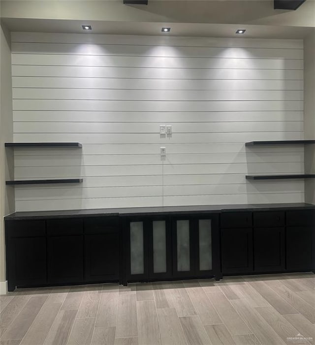 mudroom with light hardwood / wood-style flooring