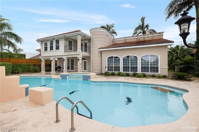 view of pool featuring a patio