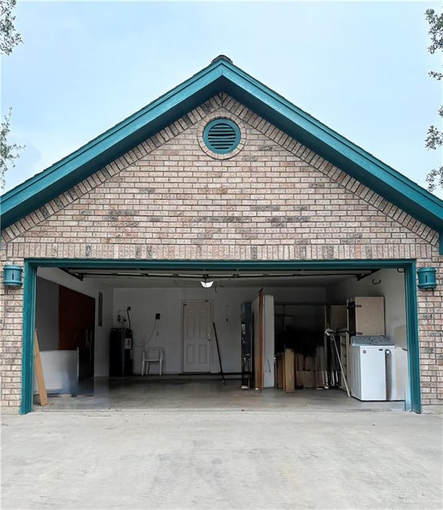 2218 Lawndale Rd, Mission, TX 78572 - garage with water heater and concrete driveway