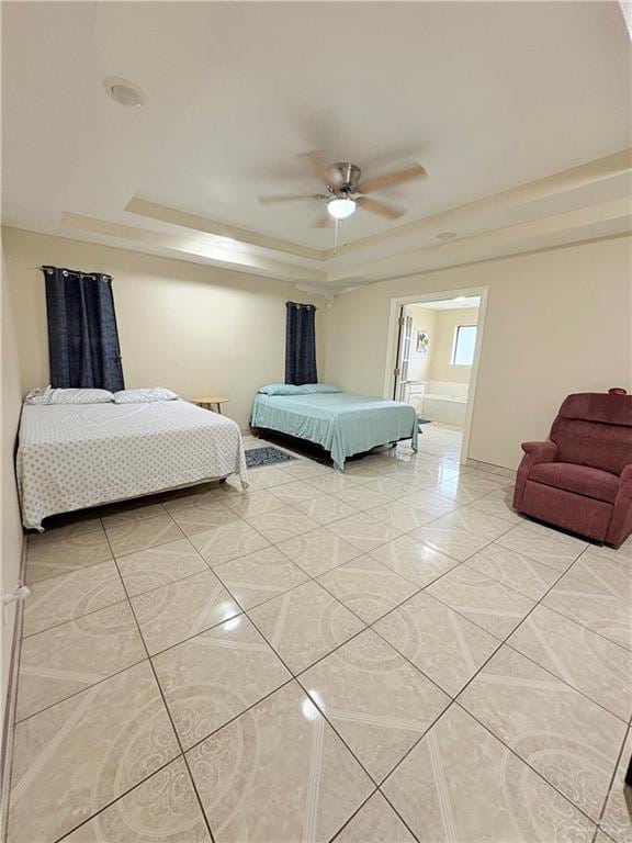 2218 Lawndale Rd, Mission, TX 78572 - bedroom with a raised ceiling, a ceiling fan, and light tile patterned floors