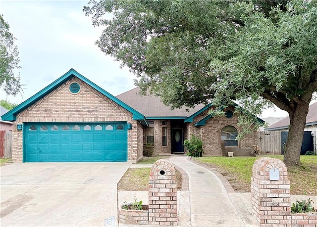 2218 Lawndale Rd, Mission, TX 78572 - single story home with an attached garage, fence, brick siding, and concrete driveway