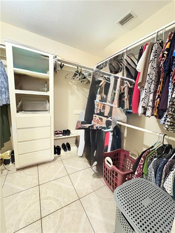2218 Lawndale Rd, Mission, TX 78572 - spacious closet with tile patterned floors and visible vents