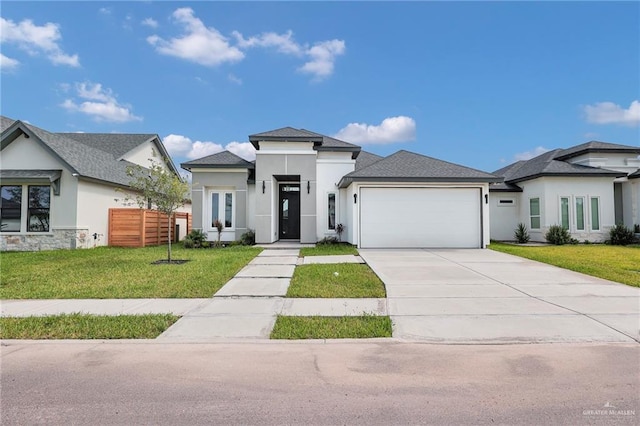 910 Azalea St, Mission, TX 78574 - prairie-style home with an attached garage, concrete driveway, and stucco siding