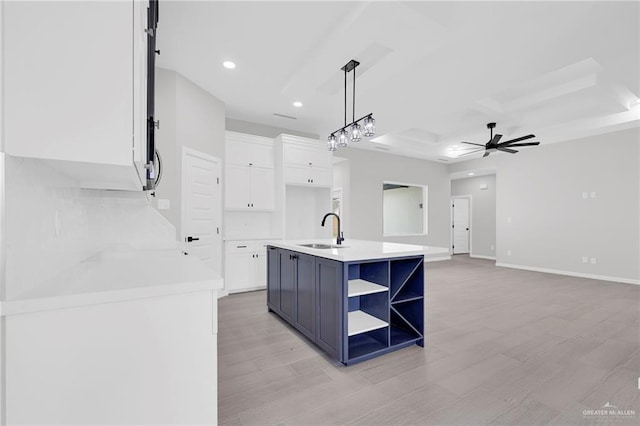 910 Azalea St, Mission, TX 78574 - kitchen with open shelves, white cabinets, light wood-style floors, ceiling fan, and recessed lighting