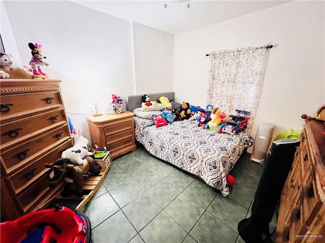 bedroom featuring tile patterned floors