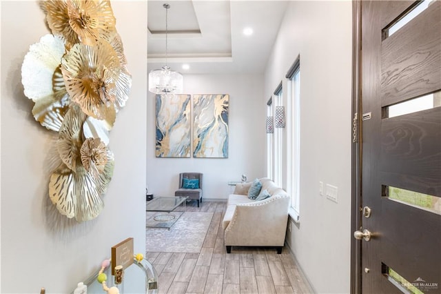 705 New Orleans Cir, Pharr, TX 78577 - foyer entrance with wood tiled floors, plenty of natural light, baseboards, recessed lighting, and a raised ceiling