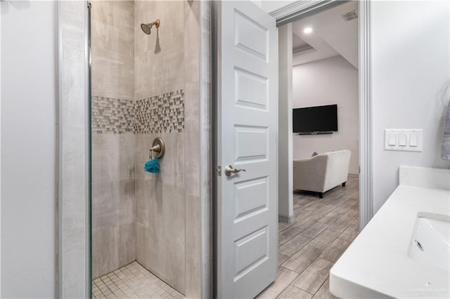 705 New Orleans Cir, Pharr, TX 78577 - full bathroom with a stall shower and wood finished floors
