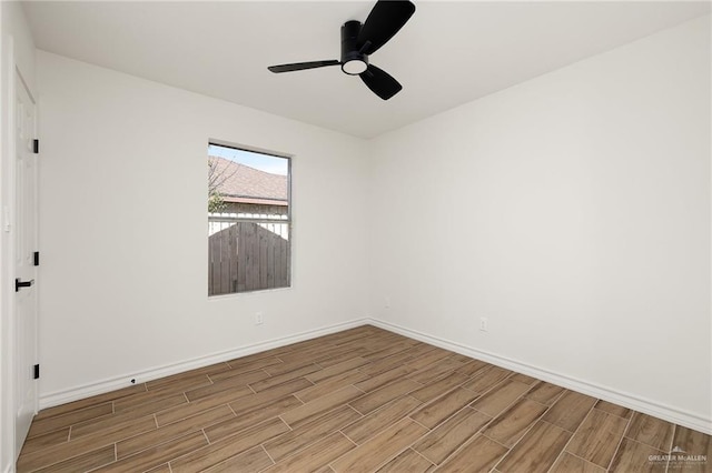 spare room with ceiling fan