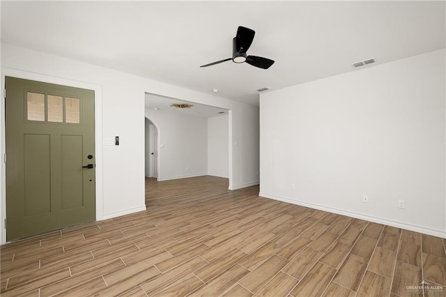 interior space featuring ceiling fan