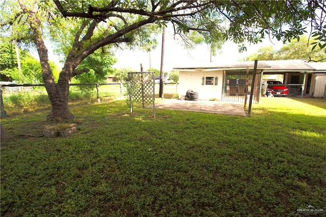 view of yard featuring a carport