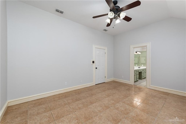 2106 Quail Ln, Mission, TX 78572 - unfurnished room with vaulted ceiling, ceiling fan, light tile patterned flooring, and baseboards