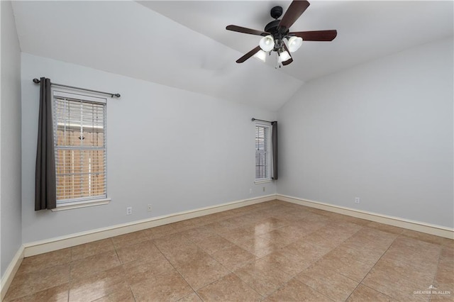 2106 Quail Ln, Mission, TX 78572 - tiled spare room with lofted ceiling, a ceiling fan, and baseboards