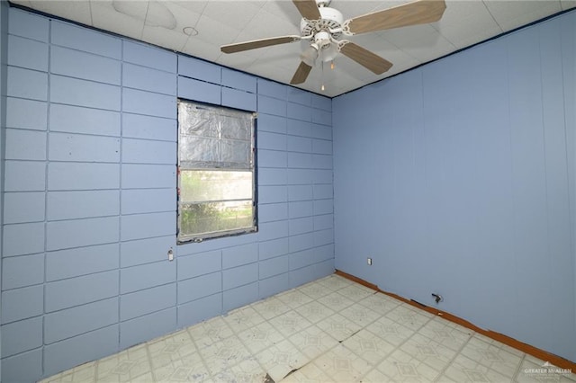 unfurnished room with a ceiling fan