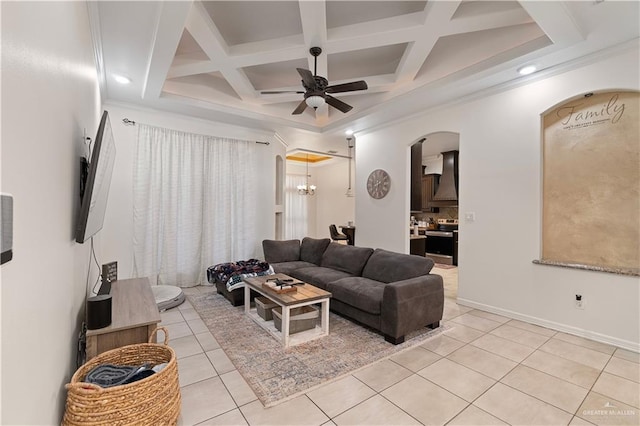 tiled living room featuring beamed ceiling, crown molding, and coffered ceiling