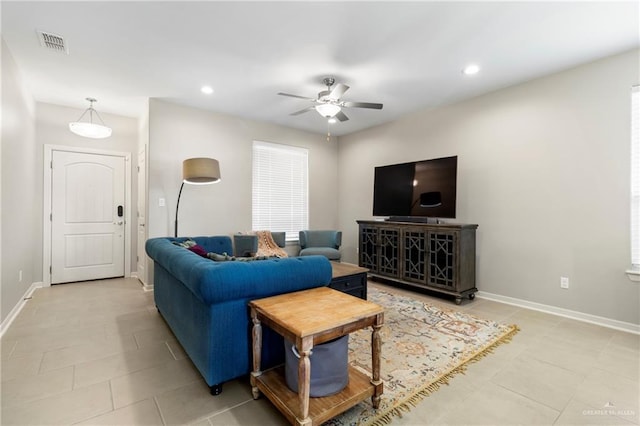 living room with visible vents, recessed lighting, baseboards, and ceiling fan