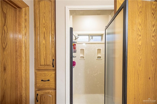 bathroom featuring a stall shower