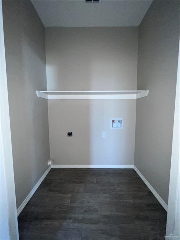 laundry area with dark hardwood / wood-style floors, hookup for a washing machine, and electric dryer hookup