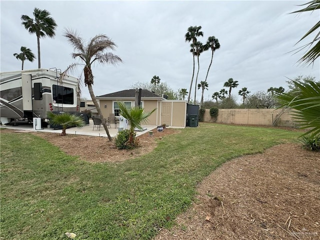 view of yard with a patio area and fence