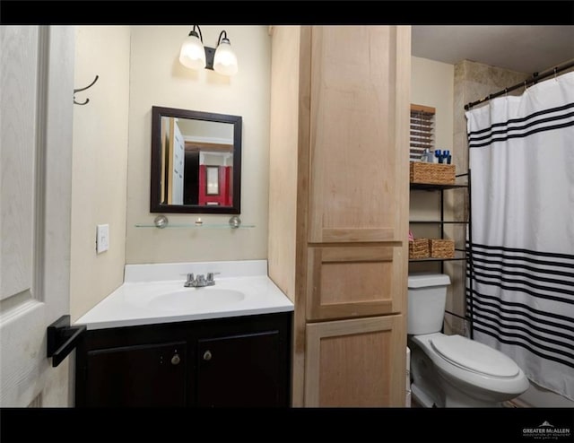 9913 Daniec St, Edinburg, TX 78542 - bathroom featuring toilet, vanity, and a shower with curtain