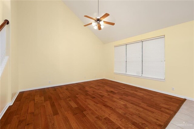 4012 Toronto Ave, Mcallen, TX 78503 - unfurnished room with a ceiling fan, high vaulted ceiling, wood finished floors, and baseboards