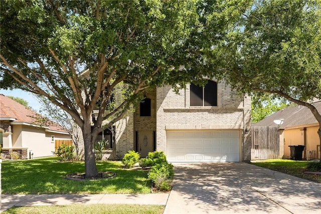 4012 Toronto Ave, Mcallen, TX 78503 - view of front of property featuring a garage, brick siding, and driveway
